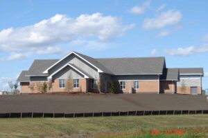 Casa House, Endicott Brick, Desert Dark, Smooth, Architectural Stone, Light Buff Brown and Blonde brick building